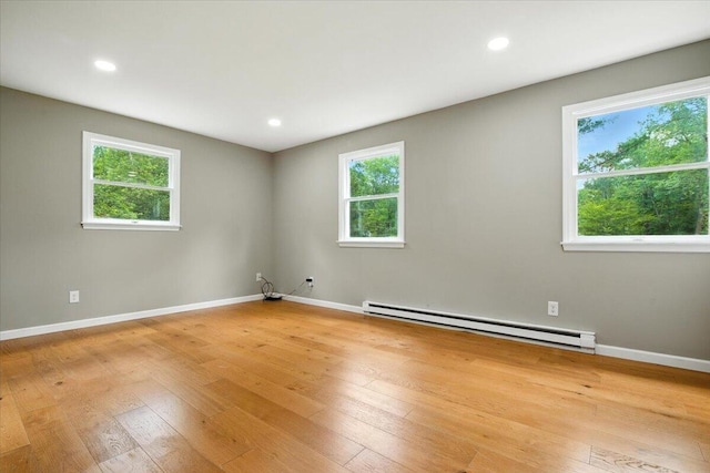 52 Bull Pine Rd, East Stroudsburg, PA 18301 - spare room with a baseboard radiator, light wood-type flooring, and recessed lighting