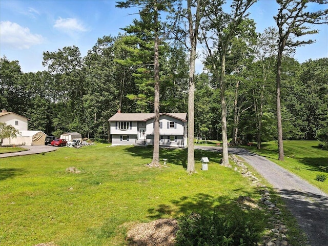 52 Bull Pine Rd, East Stroudsburg, PA 18301 - bi-level home featuring a front yard