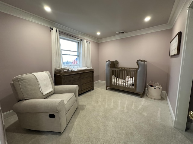 carpeted bedroom with crown molding, baseboards, and visible vents