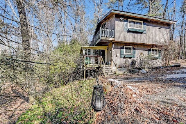 chalet / cabin featuring crawl space and a balcony