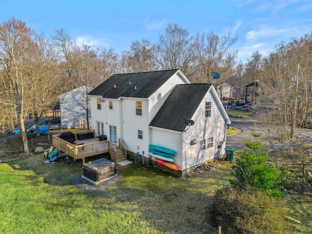 2255 Whippoorwill Dr, Tobyhanna, PA 18466 - rear view of property with a wooden deck, a yard, and roof with shingles