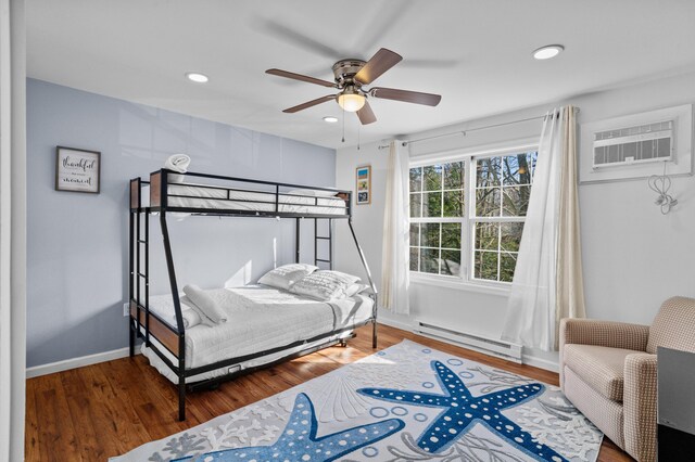 2255 Whippoorwill Dr, Tobyhanna, PA 18466 - bedroom featuring baseboards, recessed lighting, wood finished floors, and a baseboard radiator
