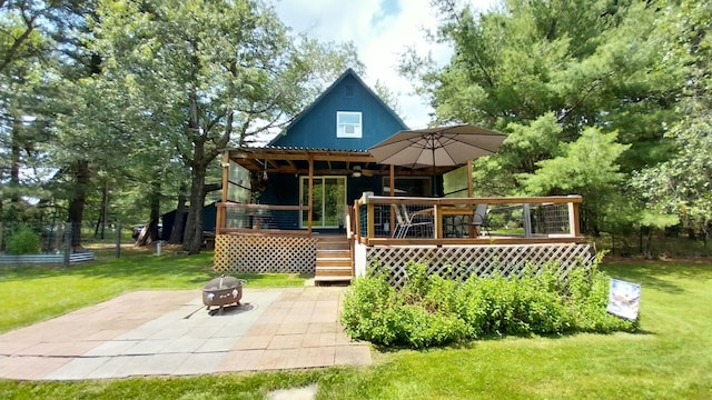 2314 Long Pond Rd, Long Pond, PA 18334 - rear view of house with a lawn, a fire pit, a patio, and stairway