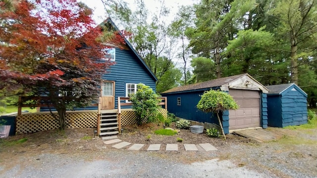 2314 Long Pond Rd, Long Pond, PA 18334 - view of front facade with an outbuilding, a wooden deck, and a garage