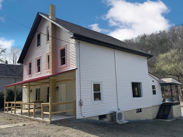 90 Packerton Dam Dr, Lehighton, PA 18235 - view of side of property with ac unit and a chimney
