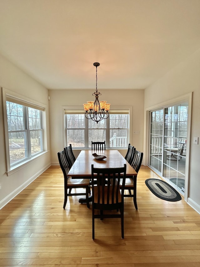 565 Ridge Rd, Bangor, PA 18013 - dining space with baseboards, light wood finished floors, and a notable chandelier
