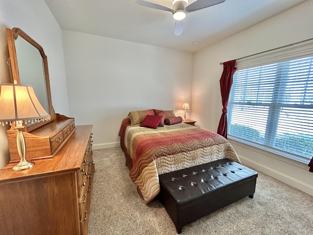 565 Ridge Rd, Bangor, PA 18013 - bedroom with light carpet, ceiling fan, and baseboards