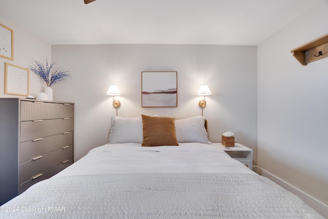 bedroom featuring baseboards