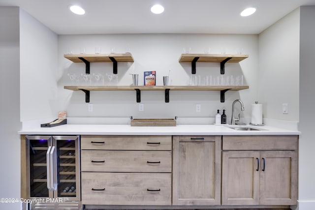 bar featuring indoor wet bar, recessed lighting, a sink, and wine cooler