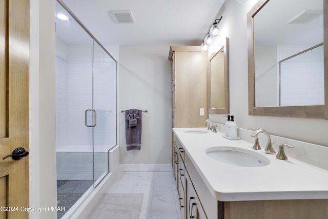 bathroom featuring visible vents, a sink, marble finish floor, and a shower stall