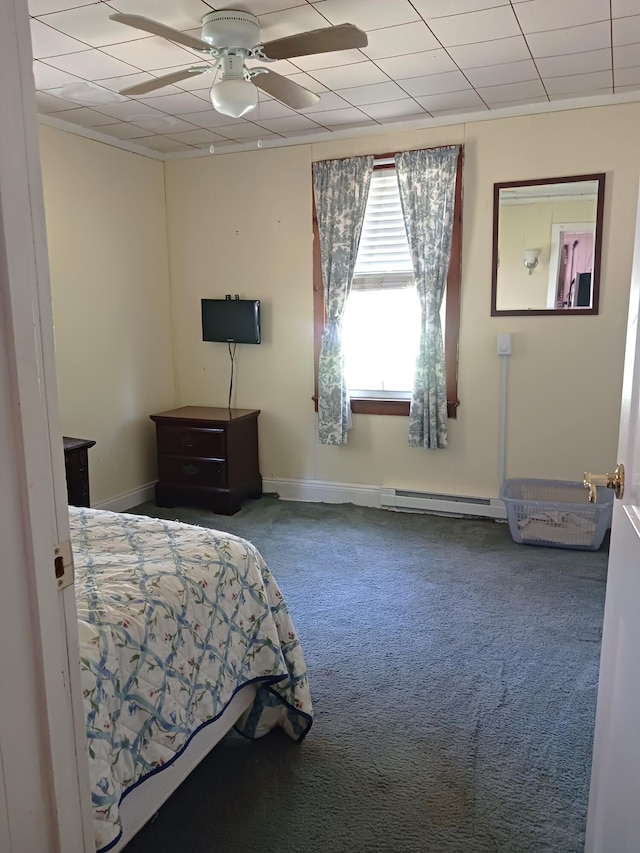 618 Mccabe Ln, Saylorsburg, PA 18353 - carpeted bedroom with baseboard heating and a ceiling fan