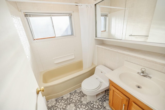 bathroom with shower / bathtub combination with curtain, toilet, tile walls, tile patterned flooring, and vanity