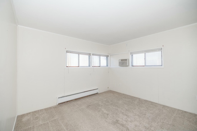 empty room with carpet and a baseboard radiator