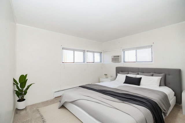 bedroom featuring light carpet