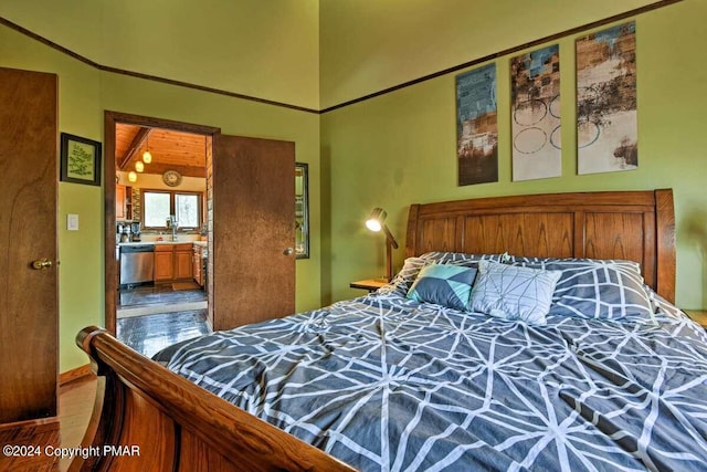 bedroom featuring wood finished floors