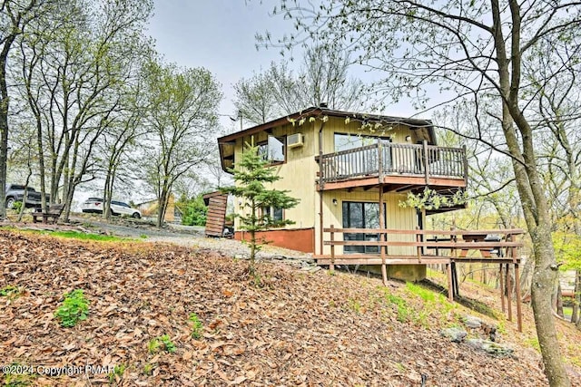 exterior space featuring a wooden deck