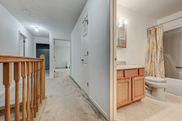 1162 Colt Ln, Pocono Summit, PA 18346 - hall with light colored carpet and a textured ceiling