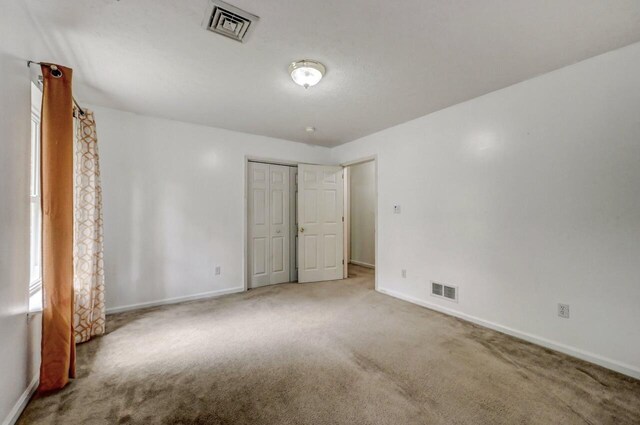 1162 Colt Ln, Pocono Summit, PA 18346 - unfurnished bedroom featuring carpet flooring and a closet
