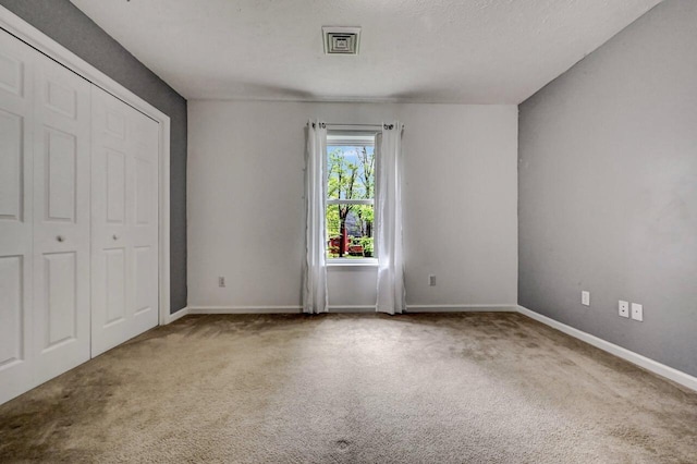 1162 Colt Ln, Pocono Summit, PA 18346 - unfurnished bedroom featuring carpet flooring and a closet