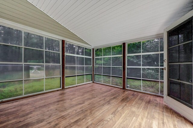 1162 Colt Ln, Pocono Summit, PA 18346 - unfurnished sunroom featuring vaulted ceiling and hardwood / wood-style flooring