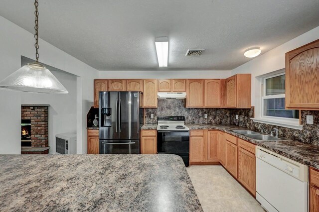 1162 Colt Ln, Pocono Summit, PA 18346 - kitchen featuring fridge with ice dispenser, electric range, dishwasher, under cabinet range hood, and backsplash