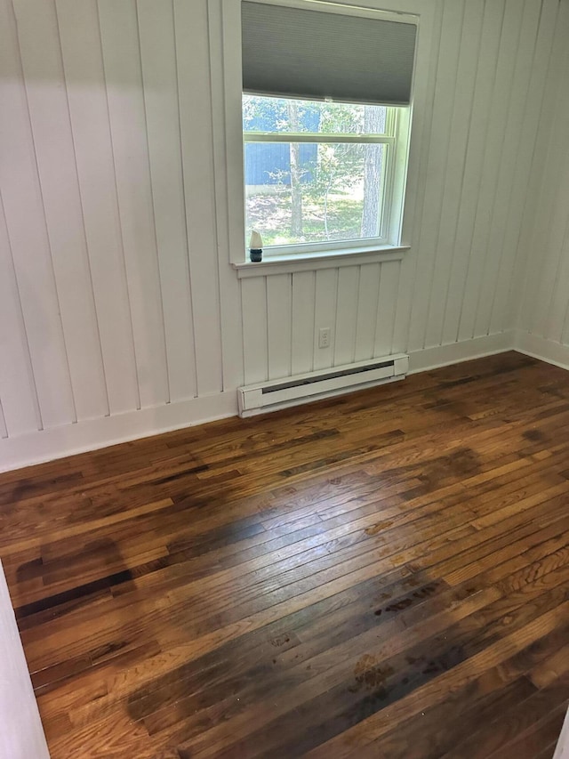 4932 Pine Ridge Dr W, Bushkill, PA 18324 - unfurnished room featuring dark wood-type flooring and a baseboard heating unit