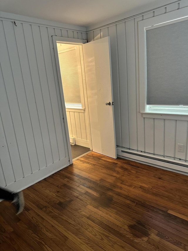 4932 Pine Ridge Dr W, Bushkill, PA 18324 - spare room with a baseboard radiator and dark wood-style flooring