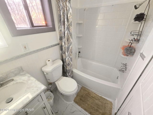 full bath featuring toilet, shower / tub combo, vanity, and wainscoting