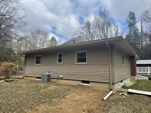 52 Tanglewood Dr, Albrightsville, PA 18210 - view of side of property with central AC unit and a chimney