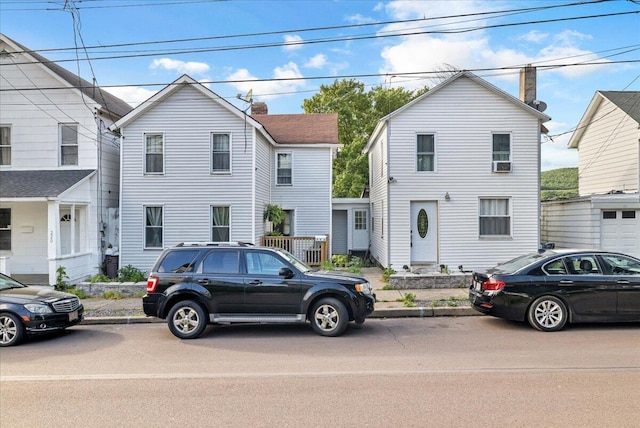 traditional-style home with a chimney