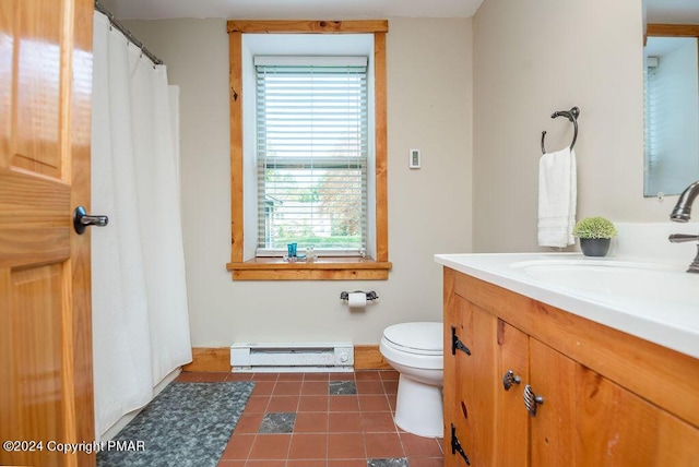 bathroom featuring tile patterned flooring, toilet, vanity, baseboards, and baseboard heating