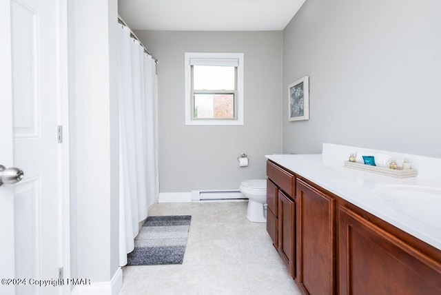 full bathroom with toilet, a baseboard radiator, baseboards, and vanity