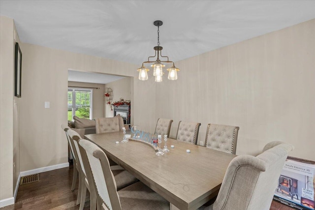 194 White Pine Trl, East Stroudsburg, PA 18301 - dining area with a chandelier and wood finished floors