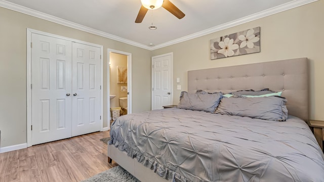 9148 Brandywine Dr, Tobyhanna, PA 18466 - bedroom with wood finished floors, ornamental molding, baseboards, connected bathroom, and a closet