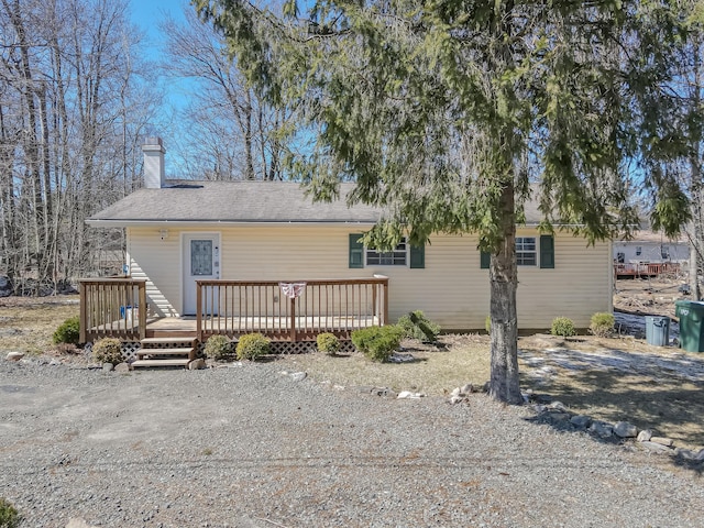 9148 Brandywine Dr, Tobyhanna, PA 18466 - view of front of home with a wooden deck and a chimney