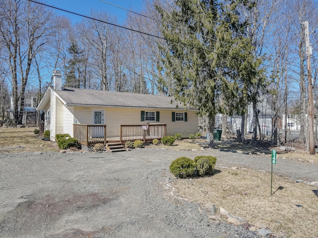 9148 Brandywine Dr, Tobyhanna, PA 18466 - view of front of house featuring a deck and a chimney
