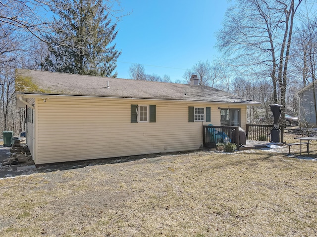 9148 Brandywine Dr, Tobyhanna, PA 18466 - rear view of house featuring a chimney and a deck