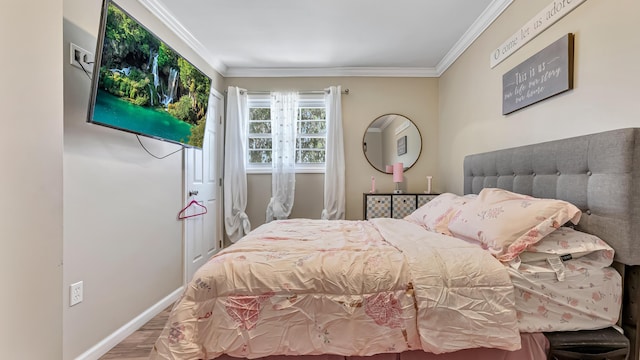 9148 Brandywine Dr, Tobyhanna, PA 18466 - bedroom with wood finished floors, crown molding, and baseboards