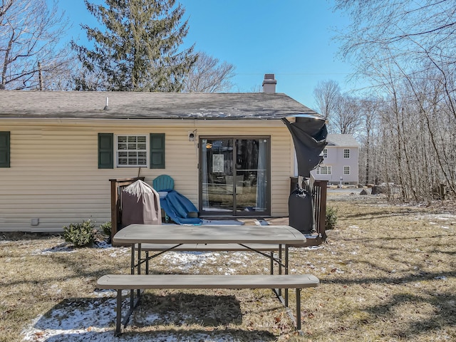 9148 Brandywine Dr, Tobyhanna, PA 18466 - back of property featuring a chimney and a shingled roof