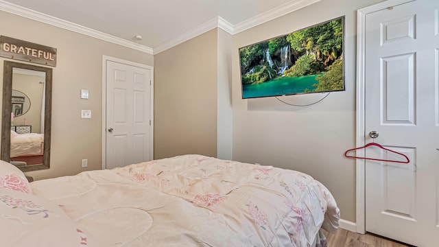 9148 Brandywine Dr, Tobyhanna, PA 18466 - bedroom featuring wood finished floors, ornamental molding, and baseboards