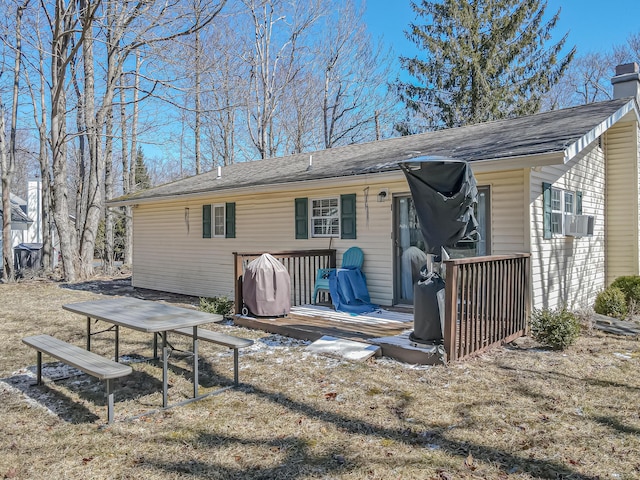 9148 Brandywine Dr, Tobyhanna, PA 18466 - rear view of house with a wooden deck, a chimney, and a shingled roof