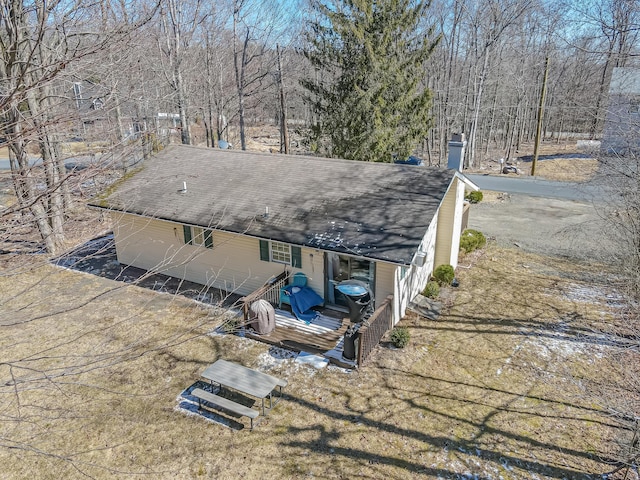 9148 Brandywine Dr, Tobyhanna, PA 18466 - back of property with a shingled roof and a deck