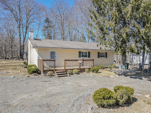 9148 Brandywine Dr, Tobyhanna, PA 18466 - single story home featuring a deck, a chimney, and a shingled roof