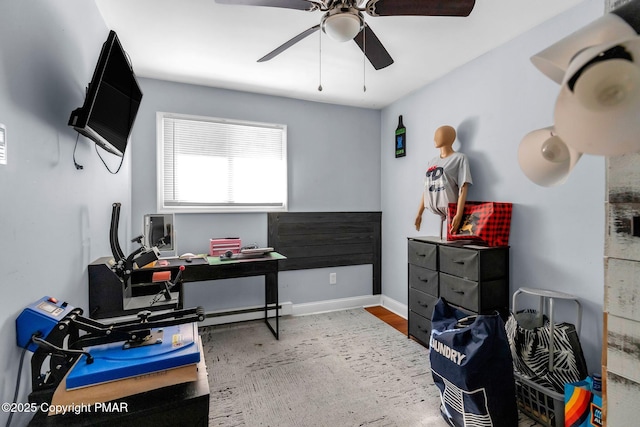 office featuring hardwood / wood-style floors and ceiling fan