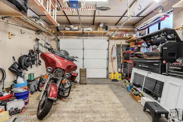 garage featuring a garage door opener