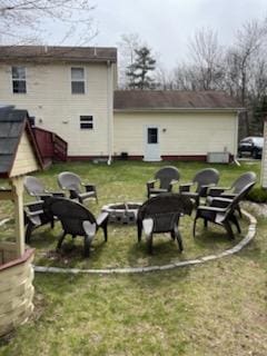 6322 Laurel Rd, Pocono Summit, PA 18346 - back of property featuring a yard and an outdoor fire pit