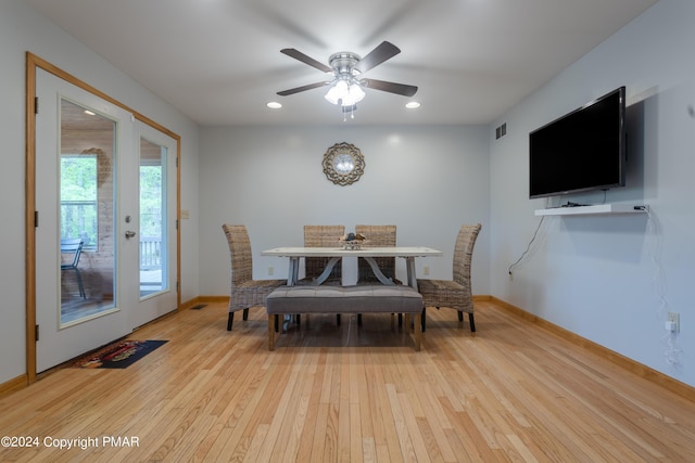 dining space with light wood finished floors, recessed lighting, visible vents, and baseboards