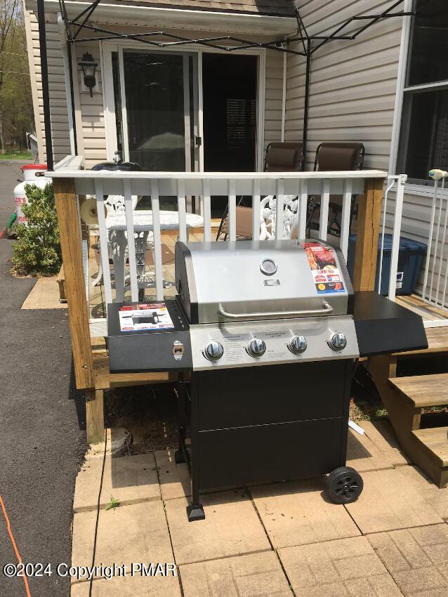 view of patio / terrace featuring a grill