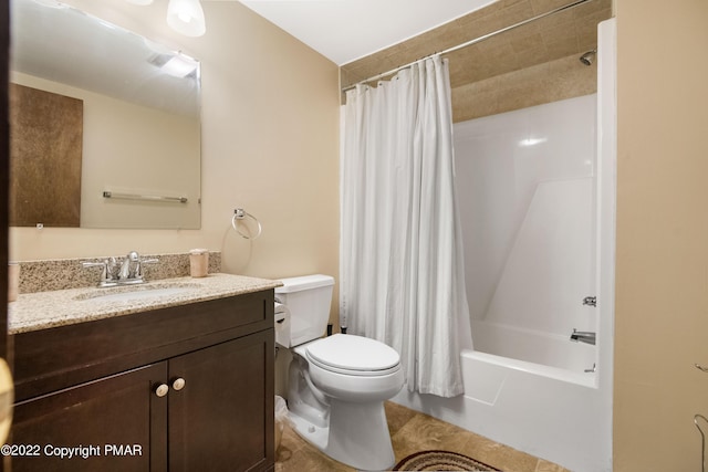 full bath featuring toilet, shower / bath combo, and vanity