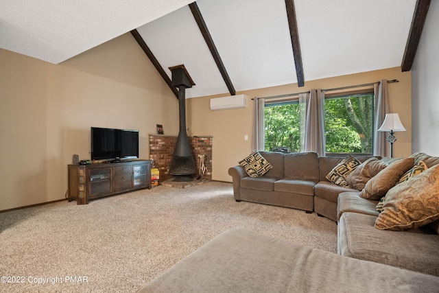 carpeted living area with baseboards, beamed ceiling, a wood stove, an AC wall unit, and high vaulted ceiling